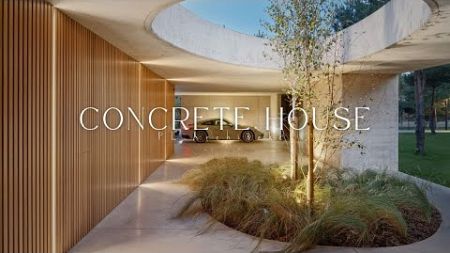 Concrete House Design combined with a wooden facade : cOncrete house