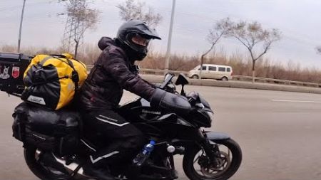 摩托车从黑河发到沈阳后重新出发，雨骑到达228国道起点丹东