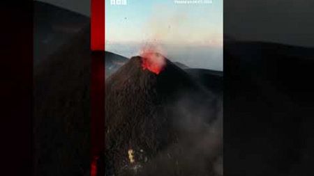 Mount Etna, Europe&#39;s most active volcano, erupts into Sicily&#39;s night sky. #Volcano #BBCNews