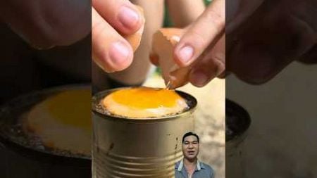 Frying eggs using a can #shorts #bushcraft #camping