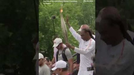 Snoop Dogg carries the Olympic torch before opening ceremony in Paris #news #snoopdogg #olympics