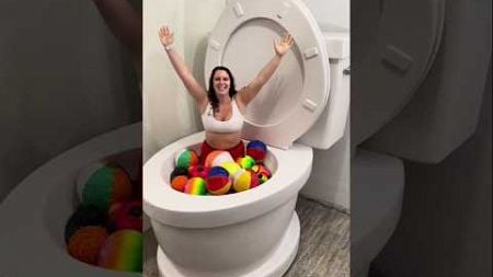 Going UNDER in Worlds Largest Toilet with Sports Balls