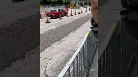 Concrete mixer dumped a large amount of wet concrete on the road, blocking traffic