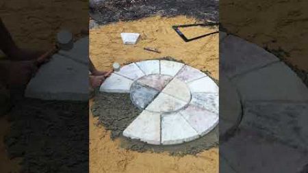 Installing 1.2 Rotunda Circle on wet mix # Dale Stone Paving