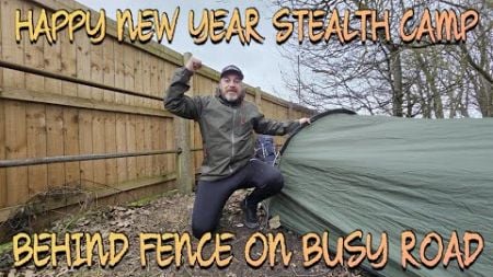 Happy New Year Stealth Camp Behind A Fence On A Busy Road