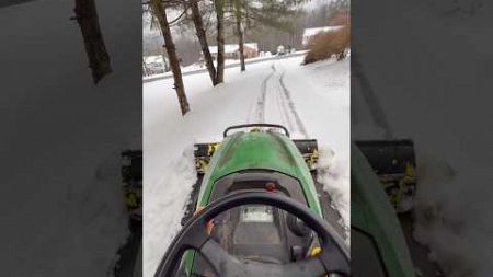 John Deere x570 pushing heavy wet snow